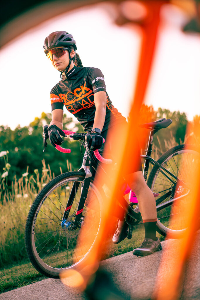 Maddy Butler riding a bike for Rock N' Road Cycling